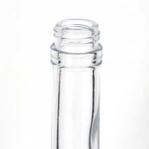 China Long neck clear glass 750 ml liquor bottle Manufacturer and Company | QLT