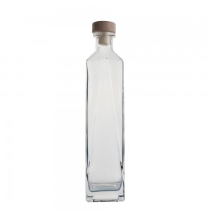 China Custom 750 ml liquor glass bottle with cork Manufacturer and Company | QLT