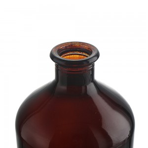 China 700 ml amber liquor round shape glass bottle Manufacturer and Company | QLT