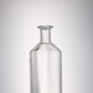 China 700 ml round liquor glass bottle with stopper cork Manufacturer and Company | QLT