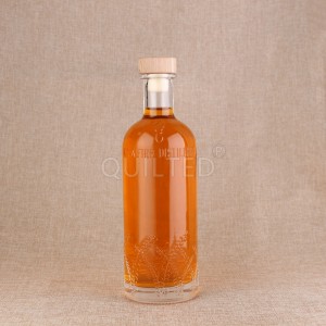 China 700ml embossed glass liquor bottle with cork Manufacturer and Company | QLT