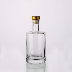 China Fancy 750 ml liquor color glass bottle with cork Manufacturer and Company | QLT