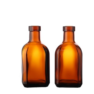 China Custom brown color liquor glass bottle with cork Manufacturer and Company | QLT