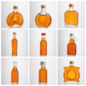 China Mini size liquor 50 ml glass vodka bottle with screw Manufacturer and Company | QLT